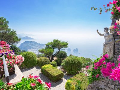 View from mount Solaro of Capri island at summer day with flowers, Italy
